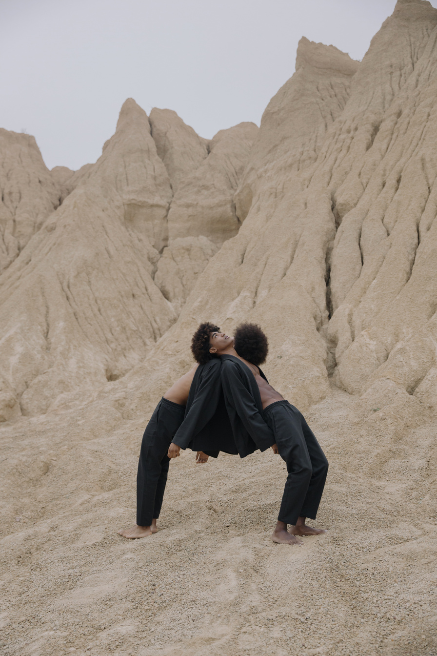 Men leaning their Heads on one another